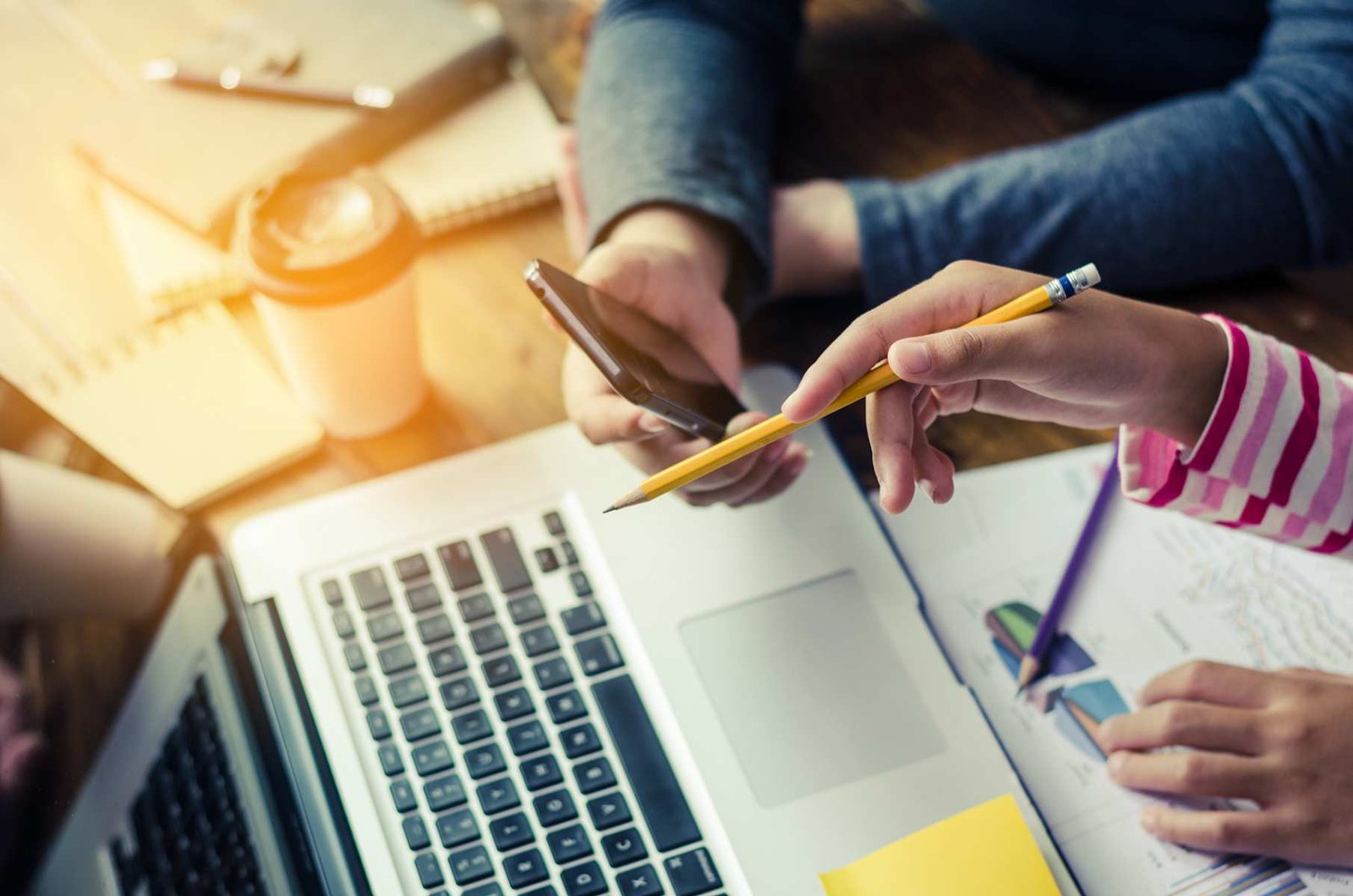 working at laptop | practical english language training for doing business in the U.S.