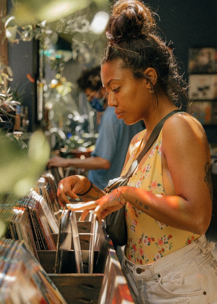woman shopping vinyl records | Learn English from Anywhere
